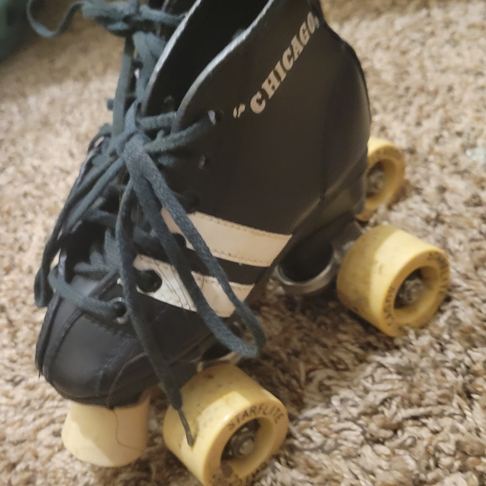 Chic Black and White Roller Skates with Classic Quad Design